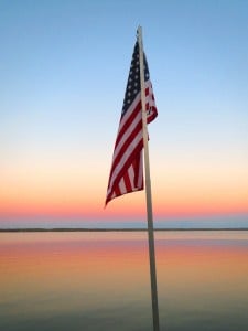 flag over the Seneca lake shoreline